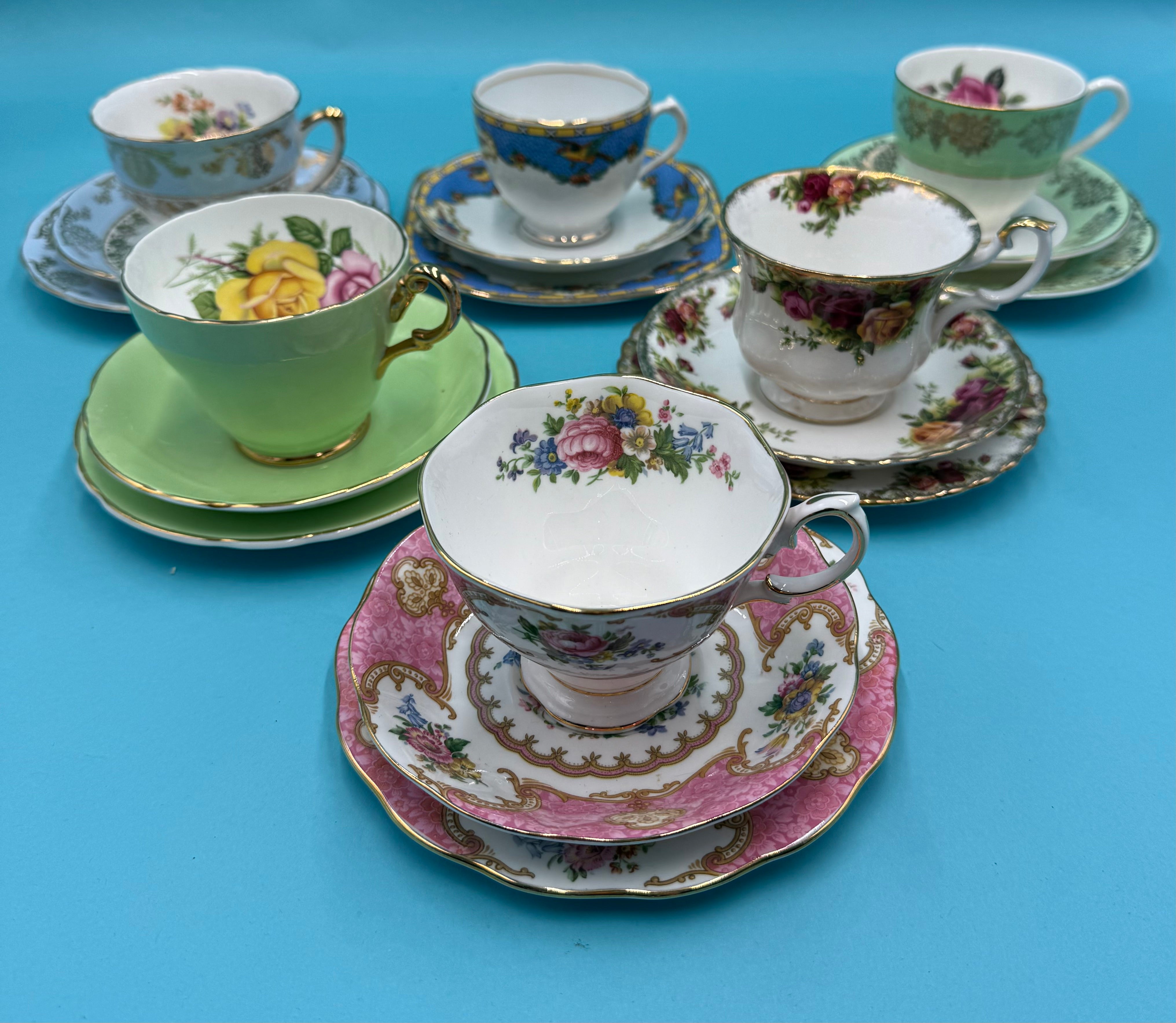 A curated selection of vintage tea cups, saucers, and side plates from Bluebells & Thyme.