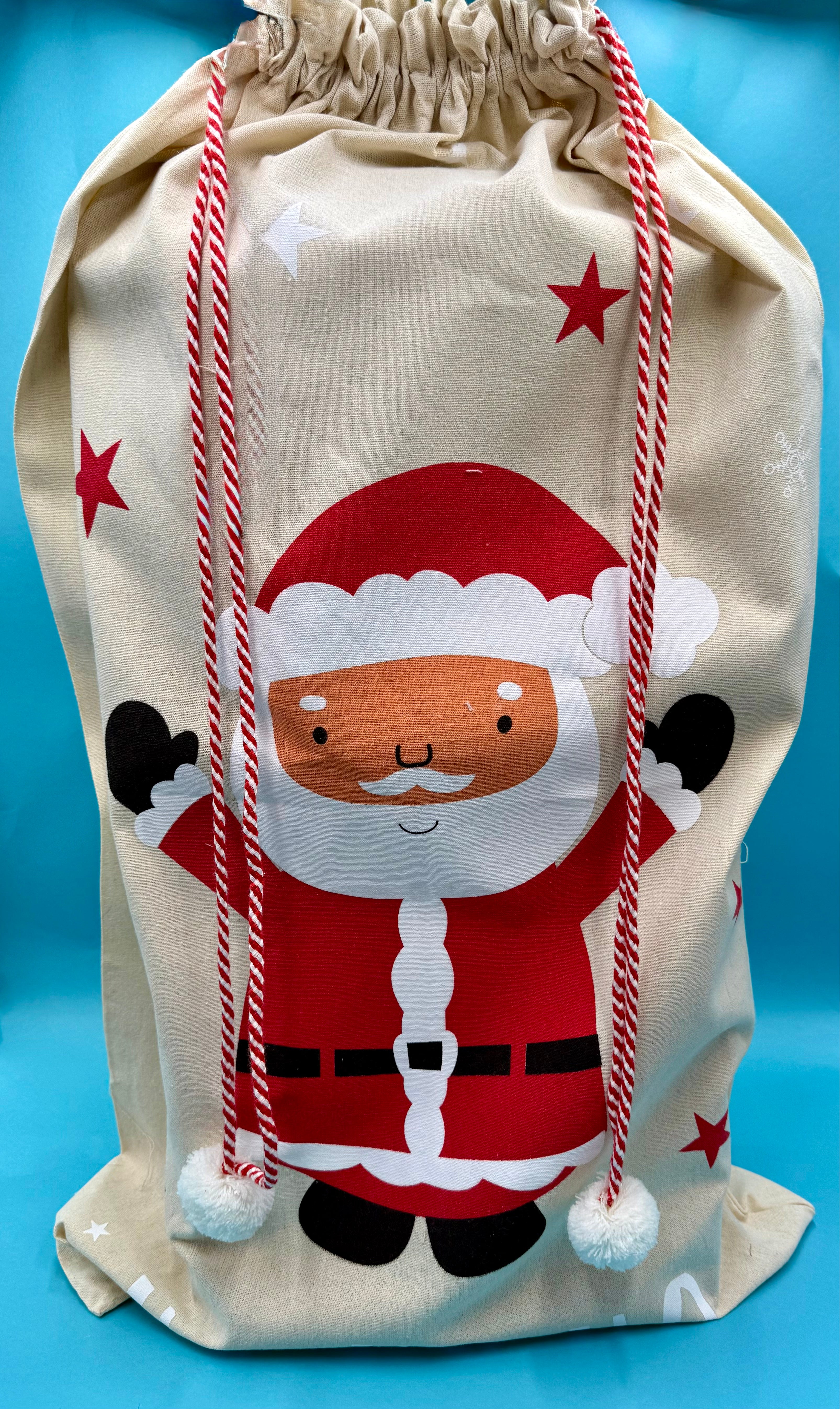 Santa's sack, drawstring bag with a cartoon Santa Claus design