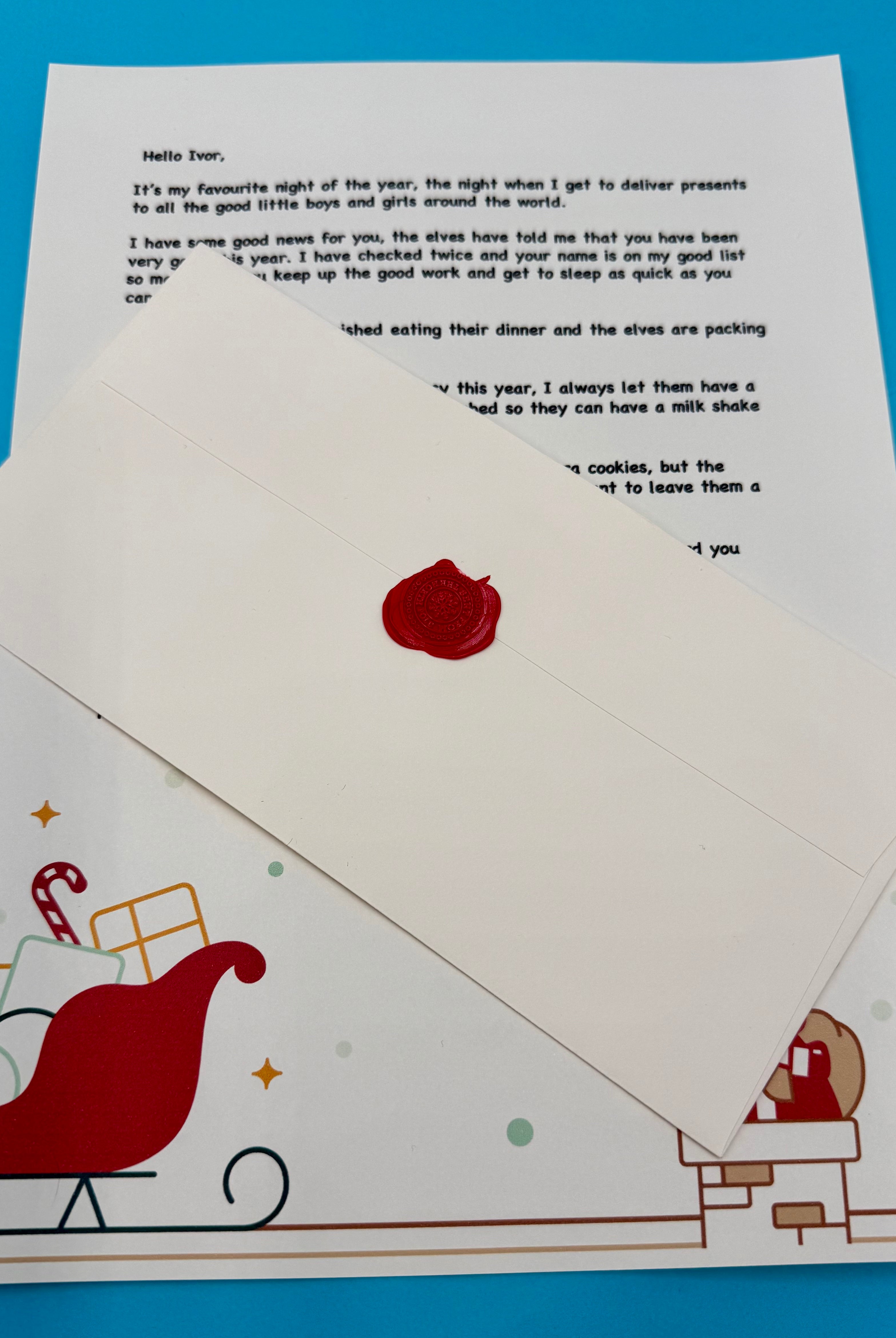 Letter from Santa Claus with a red wax stamp on a blue background