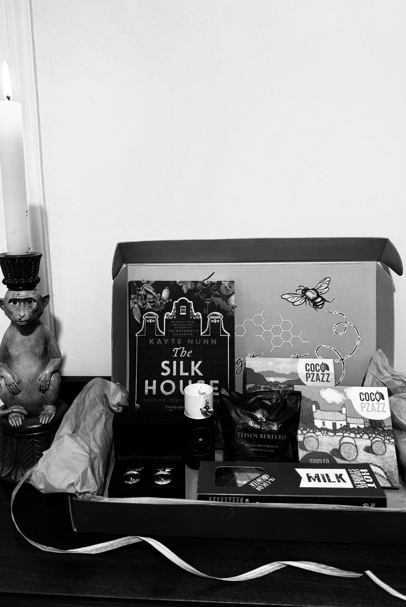 Letterbox gift including Silk House by Kayte Nunn, vintage cufflinks and welsh artisan food