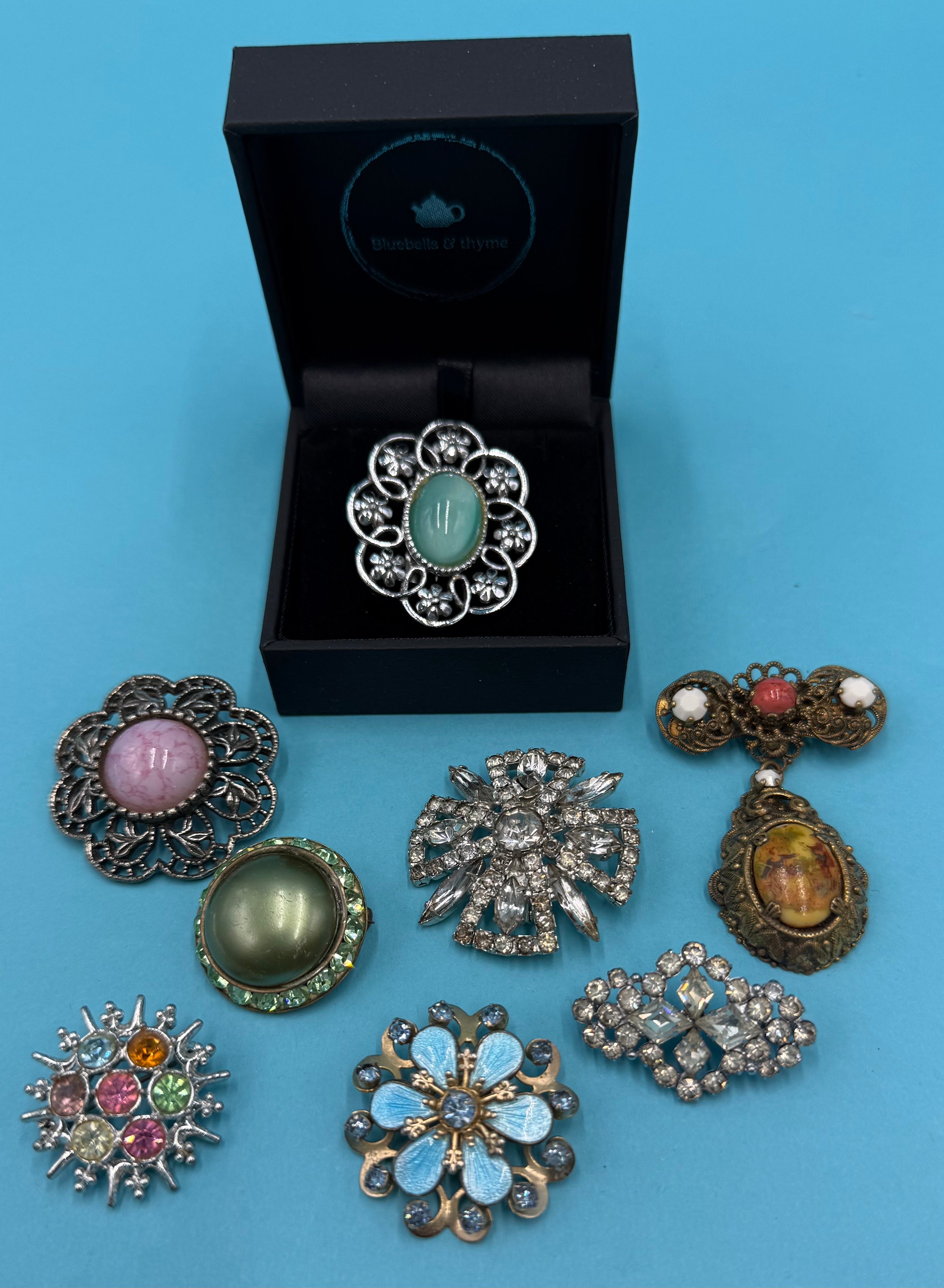 Bluebells & Thyme's curated collection of antique brooches.